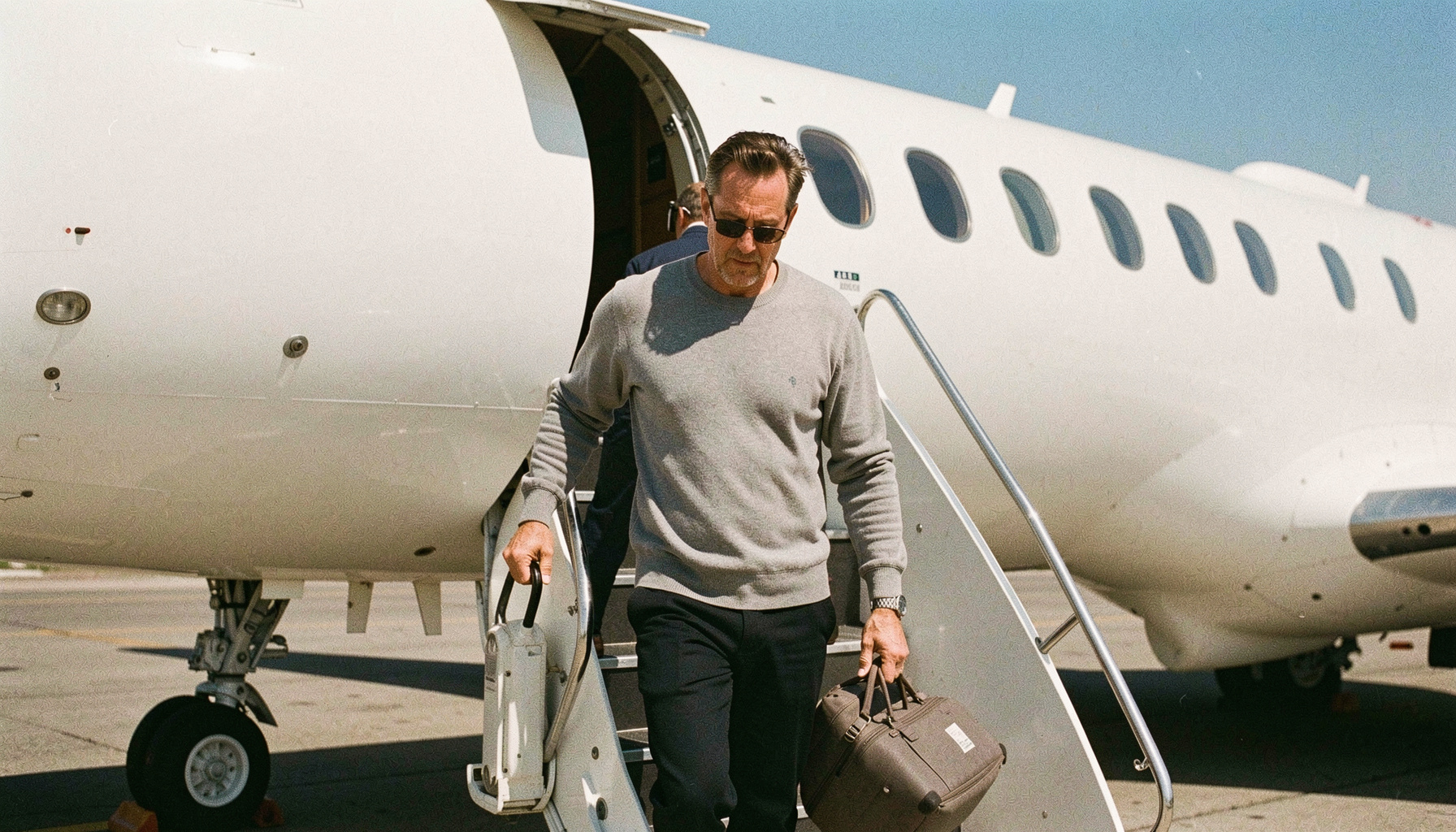 Woods Steps Off Private Plane After Month-Long Rehab Following DUI Arrest